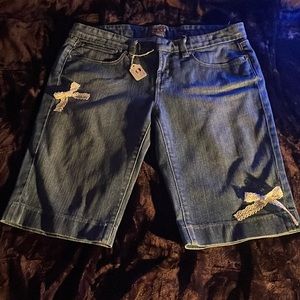 blue wash jean jorts with bedazzled back pockets